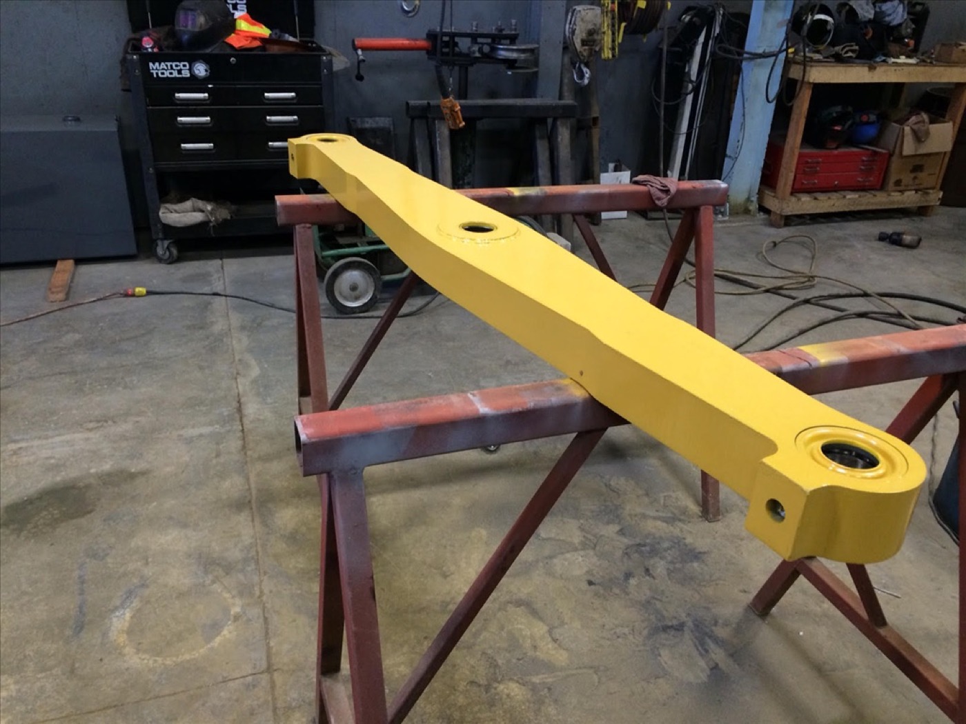 Heavy duty equalizer bar machined and finished in yellow