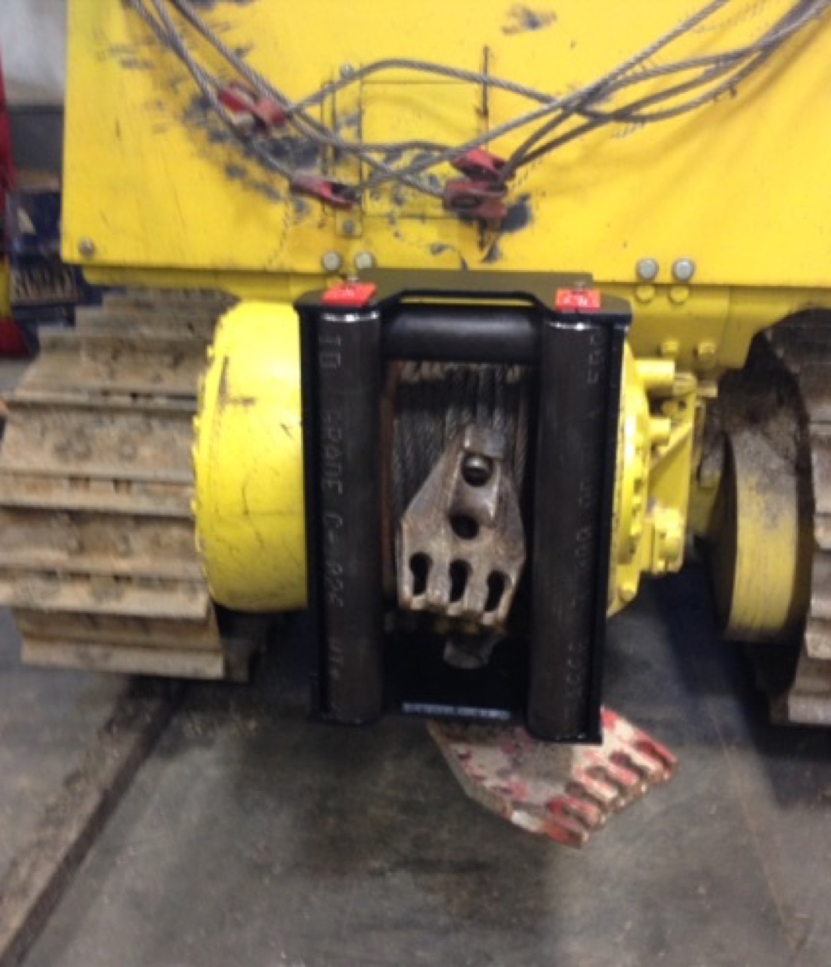Winch fair lead rollers fabricated and mounted on a tracked machine